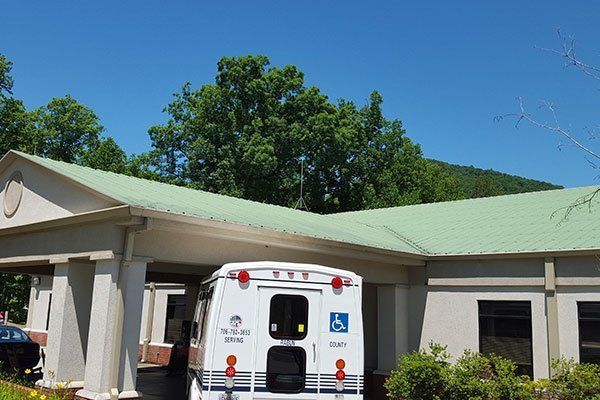 Service Car Outside The House — Candler, NC — ARS Construction Service