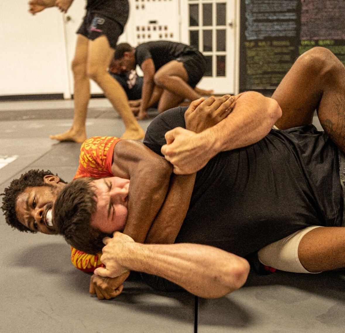 Adult students drilling no-gi grappling at 10th Planet Jiu-Jitsu Miami in Miramar, FL to build calm under pressure