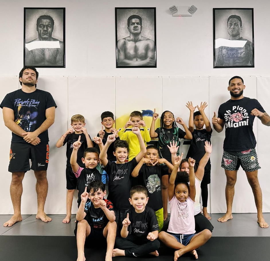 Kids practice controlled grappling in a Youth Jiu-Jitsu class at 10th Planet Jiu-Jitsu Miami in Miramar, FL, building confidence