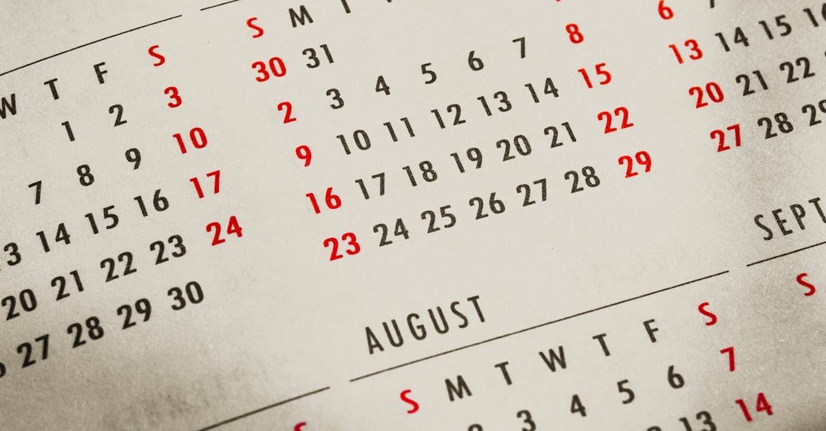 A close up of a calendar showing the month of august