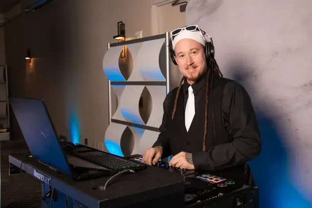 A passionate DJ with roots in Reggae and EDM, Kyle thrives on crowd energy—and sometimes joins the dance floor himself. His upbeat spirit and natural rhythm get everyone moving.