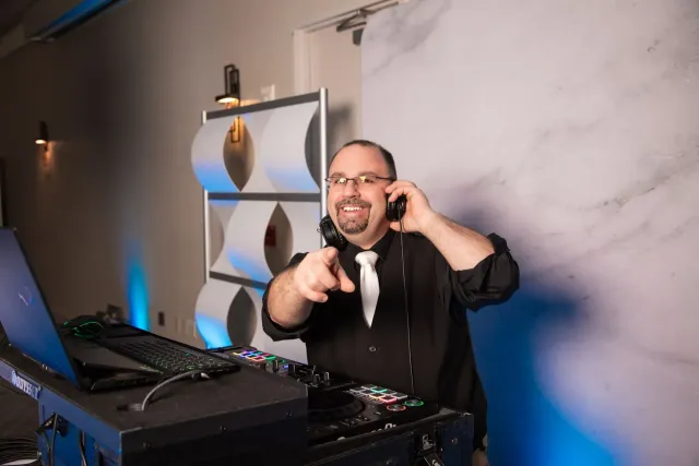 With over 15 years in wedding DJ and MC services—and a background in live sound engineering—Rich combines technical precision with a vibrant, confident personality. He’s a rock-solid choice for flawless sound and a fantastic time.