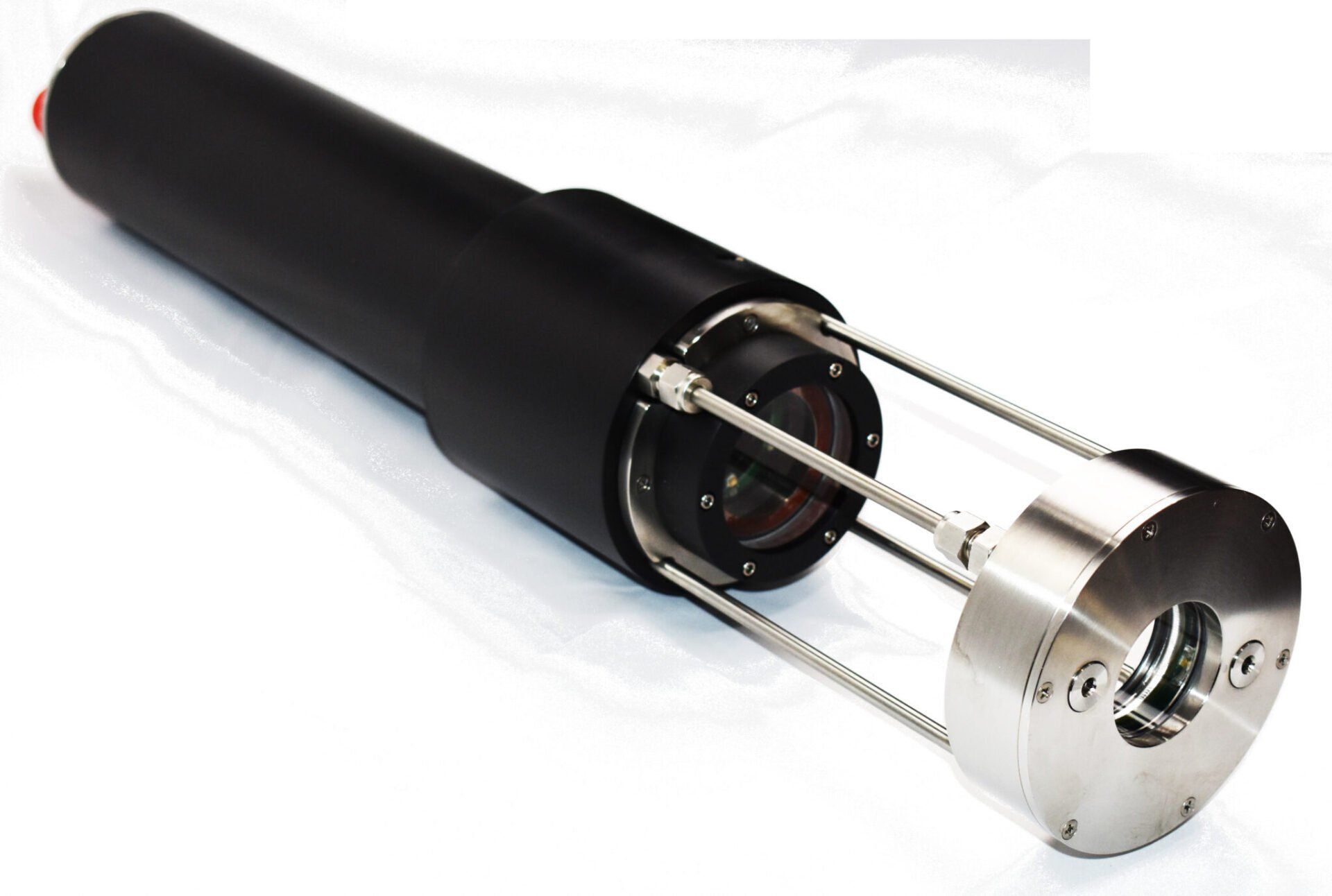 A black and silver object with a hole in the middle