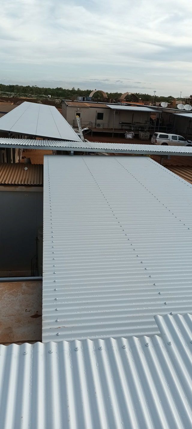 Overhead View of White Corrugated Metal Roofs — KNG Roofing And Construction in Darwin, NT