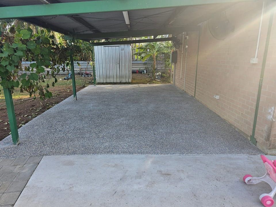 Gravel-covered Carport With a Concrete Slab in Front — KNG Roofing And Construction in Alice Springs, NT