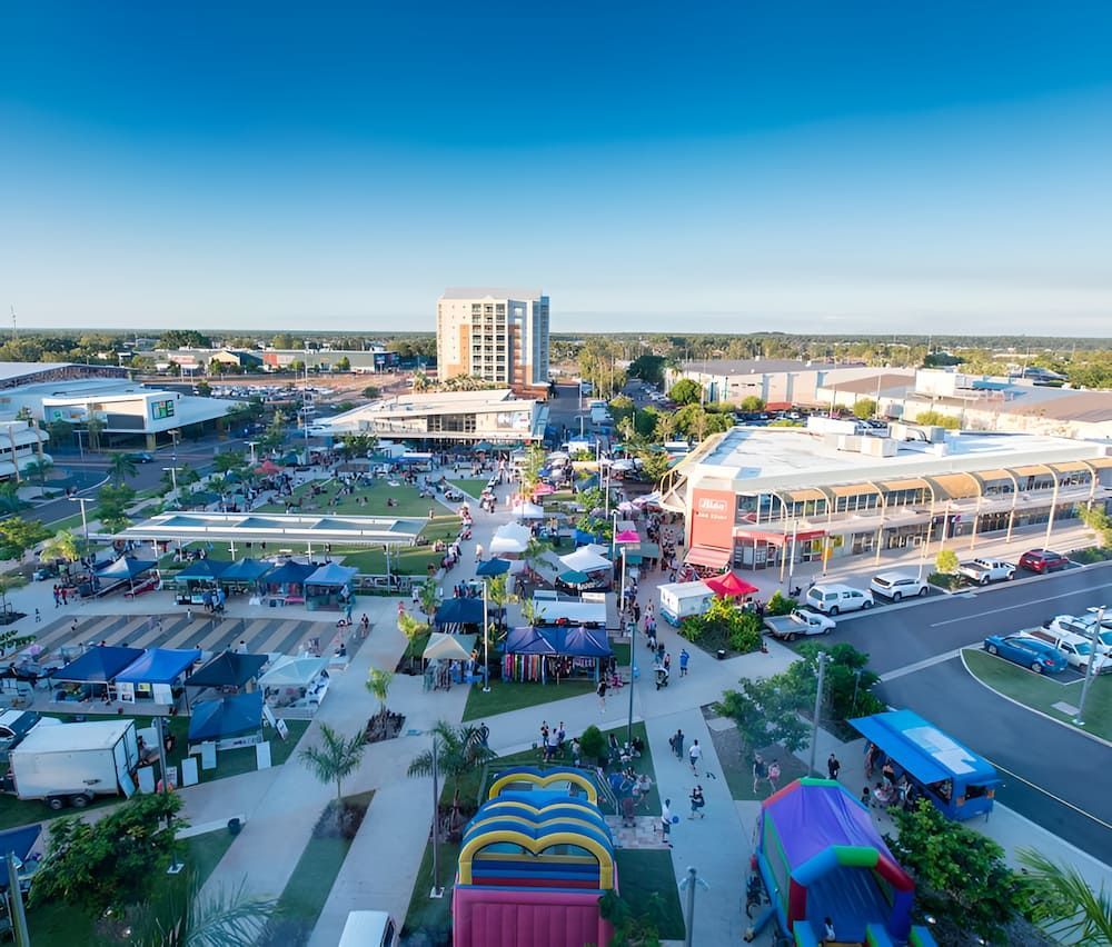 Aerial View of an Outdoor Event With Market Stalls — KNG Roofing And Construction in Palmerston, NT