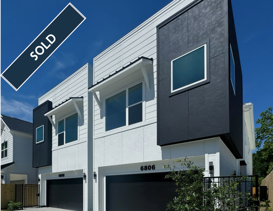 Modern townhome with black and white exterior, 