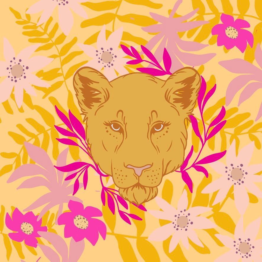 Bufanda circular con estampado floral en tonos naranja, rosa y marrón, colocada sobre tela blanca.