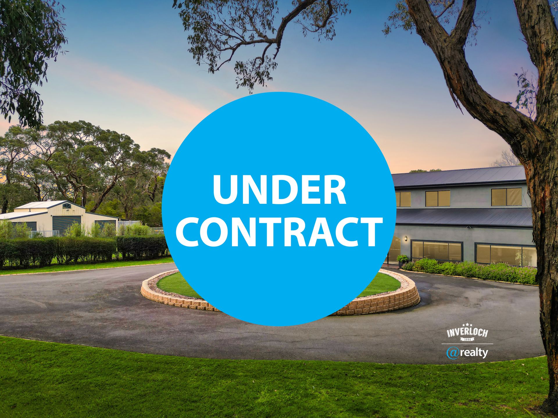 A house with a circular driveway, marked 