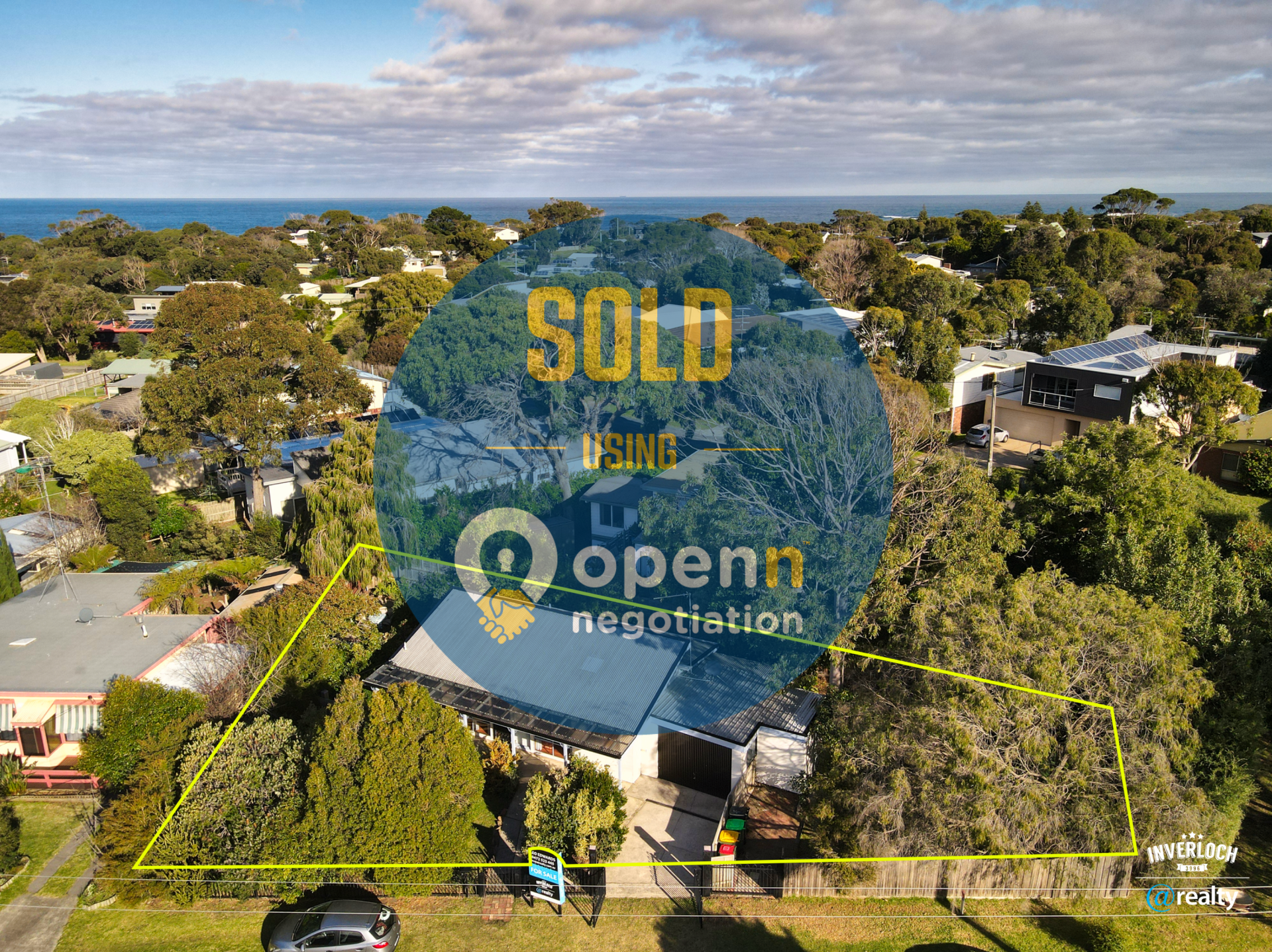 An aerial view of a house that has been sold.