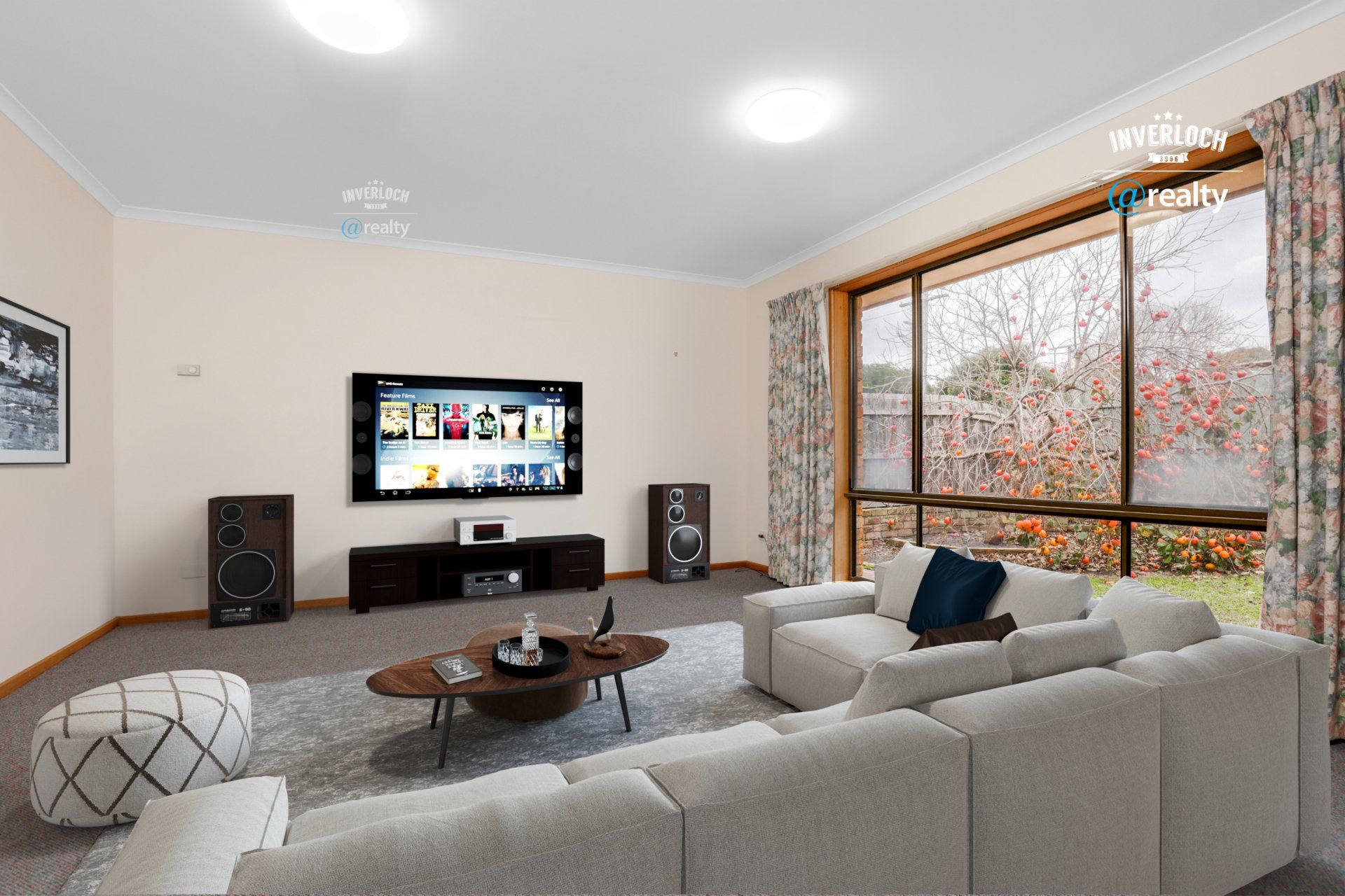 A living room with a couch and a flat screen tv