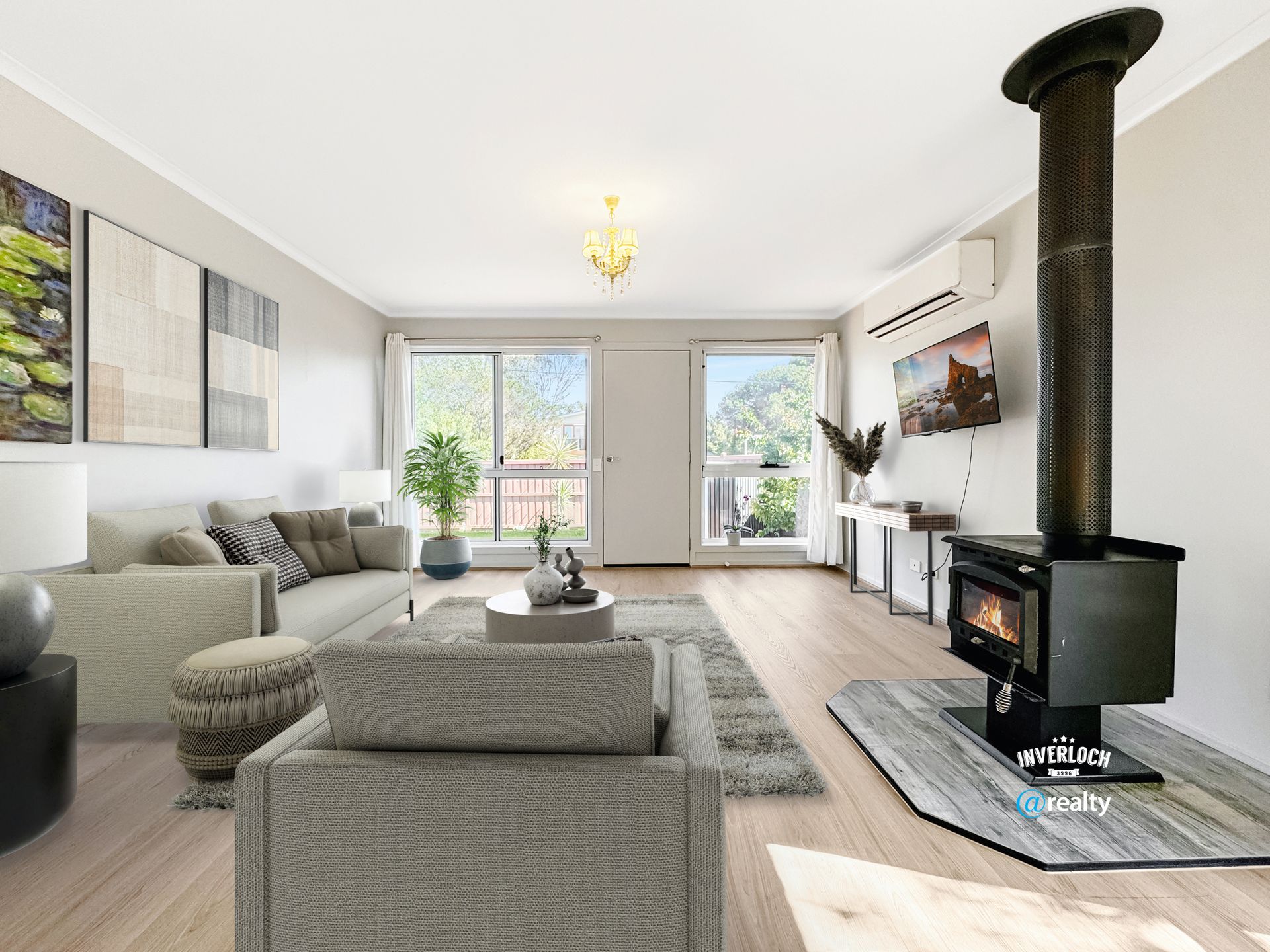 A living room with a fireplace and a couch.