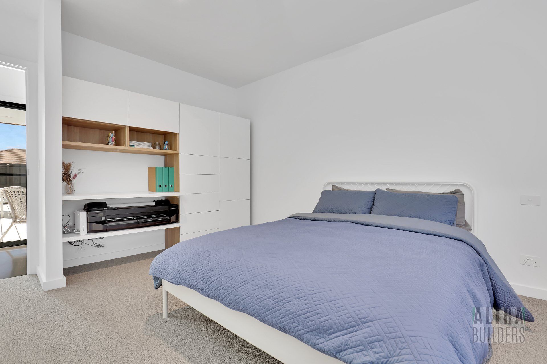 There is a large bed in the middle of the room.