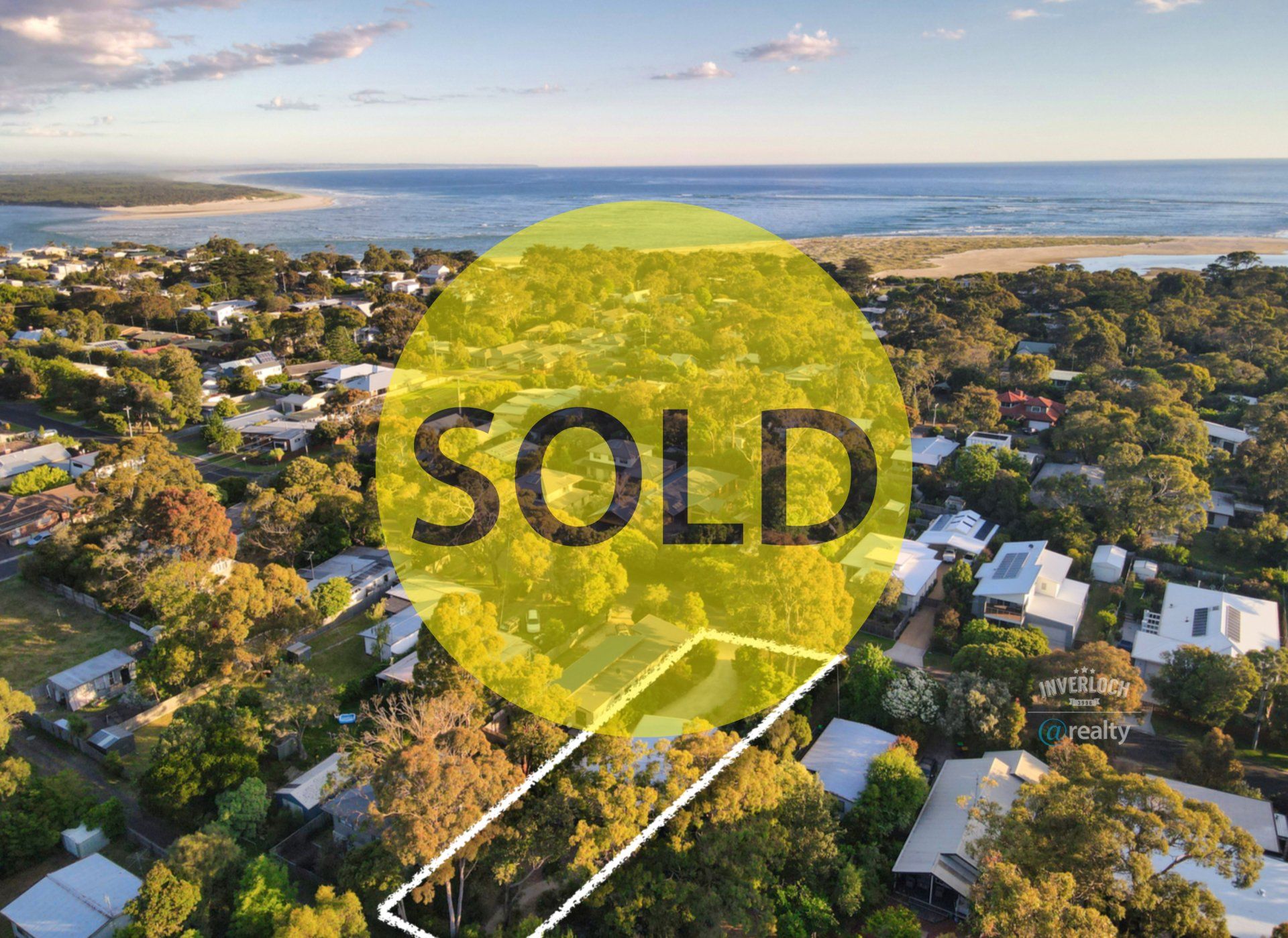 An aerial view of a house that has been sold