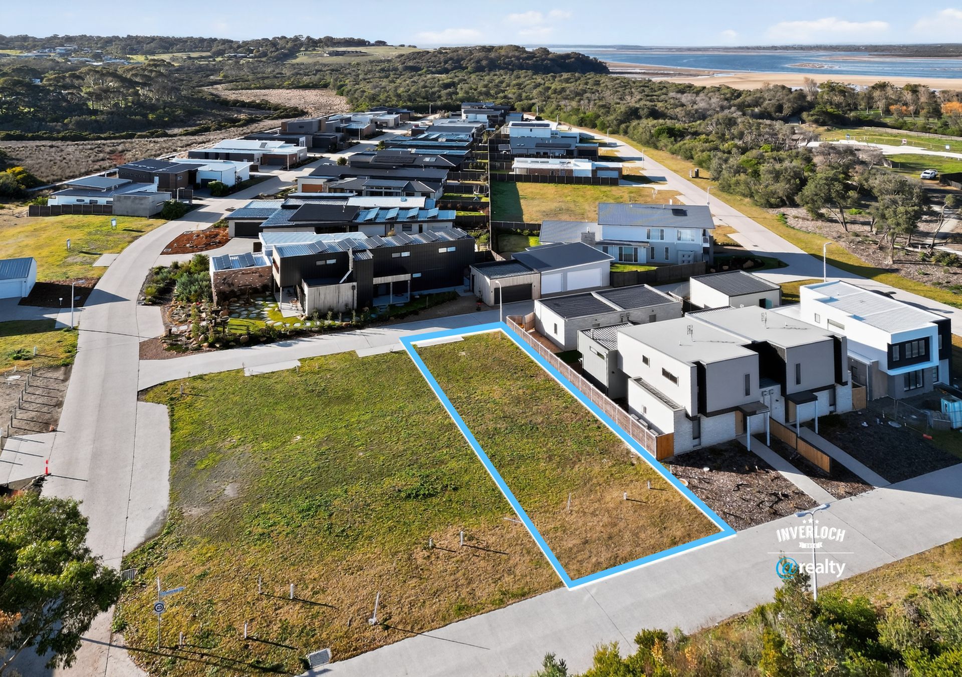 An aerial view of a residential area with lots of houses