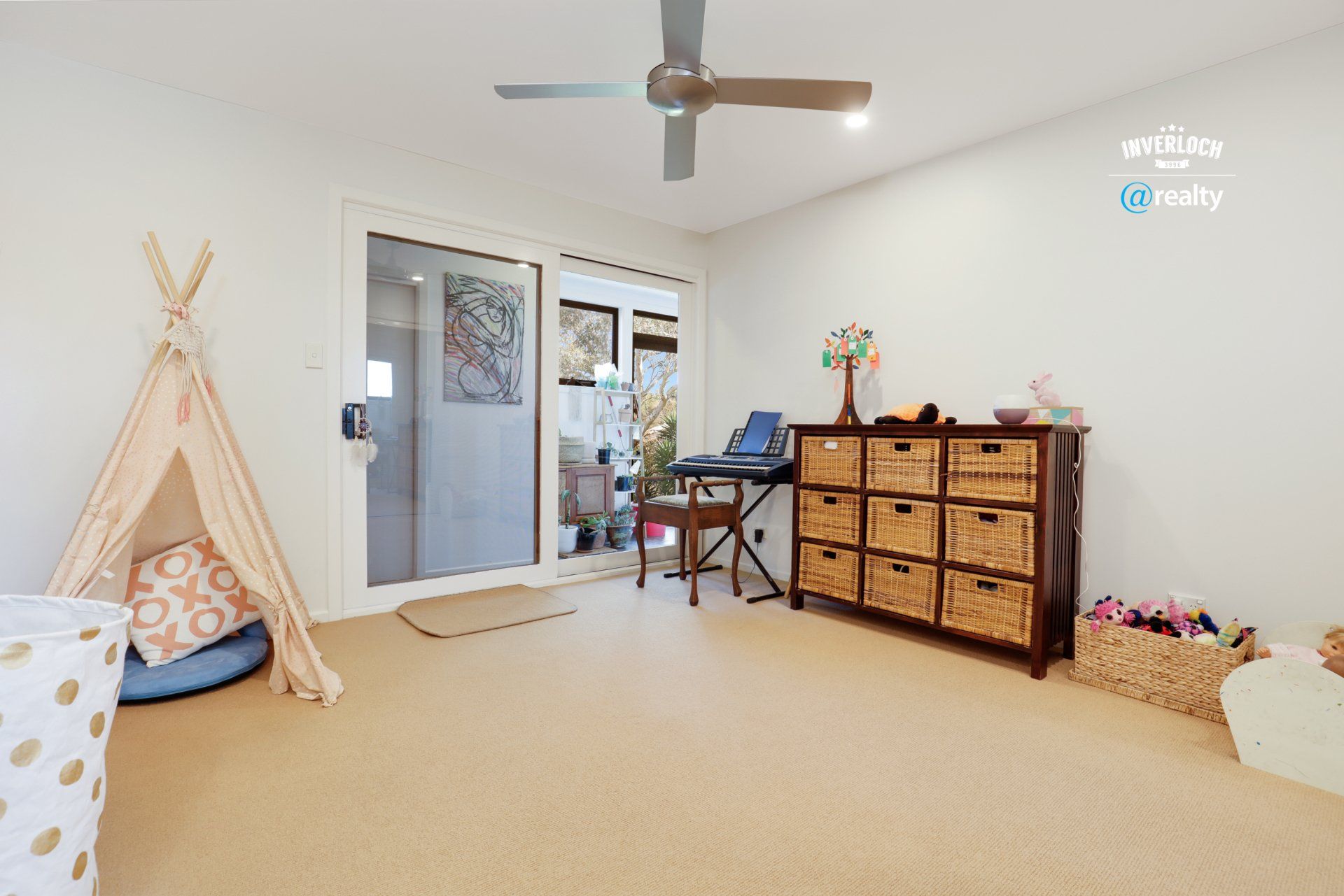 There is a teepee in the middle of the room.