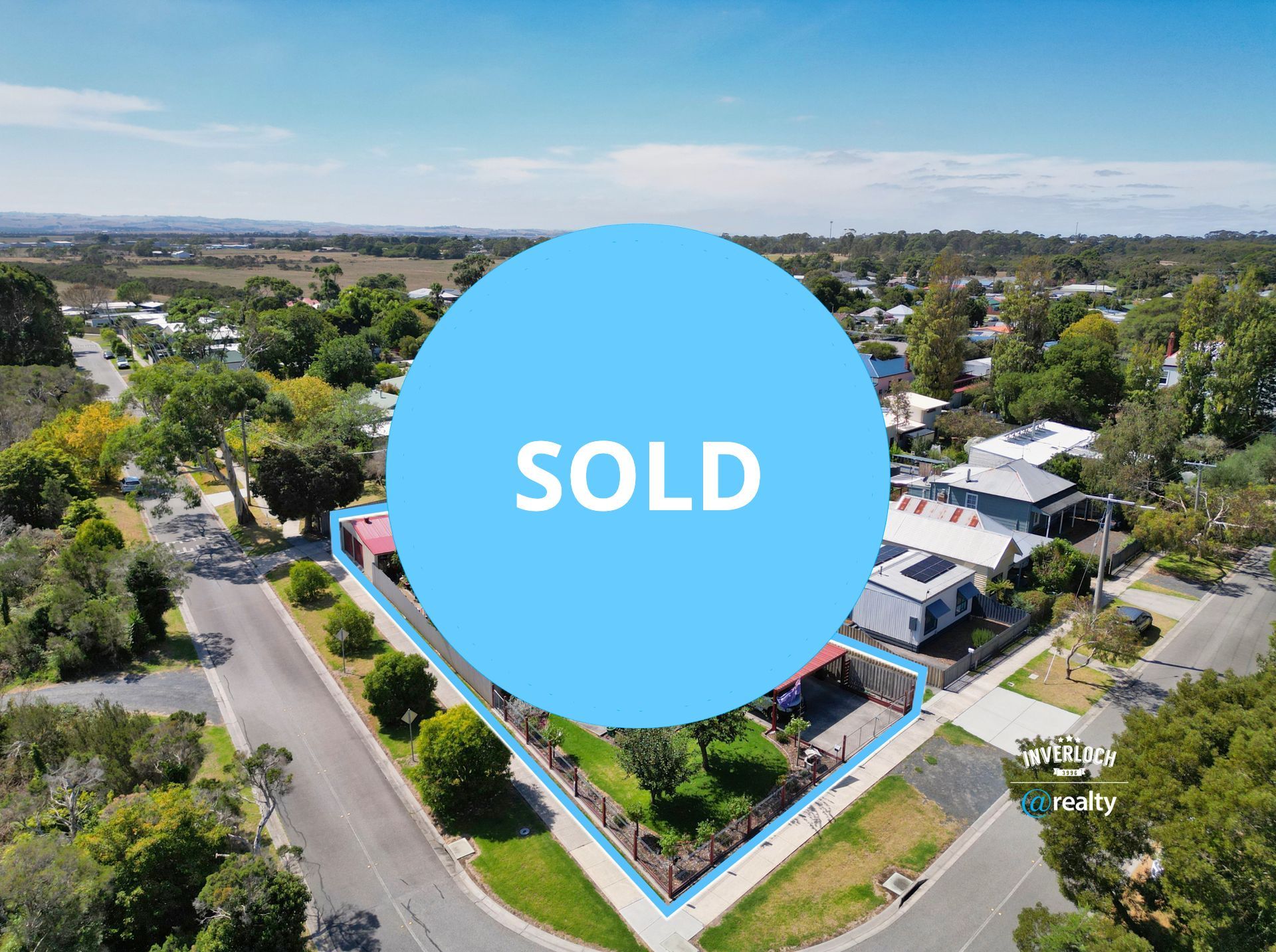 An aerial view of a house that is under contract