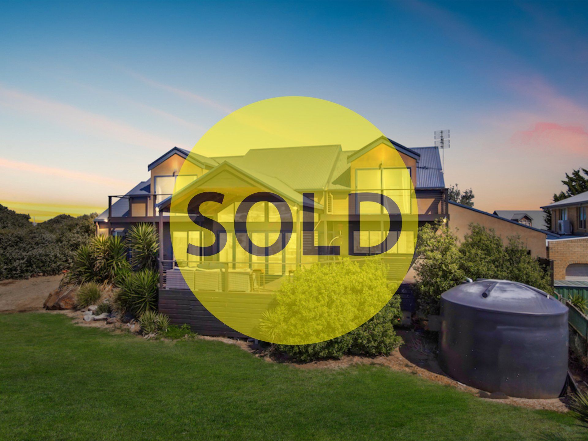 A picture of a house that has been sold