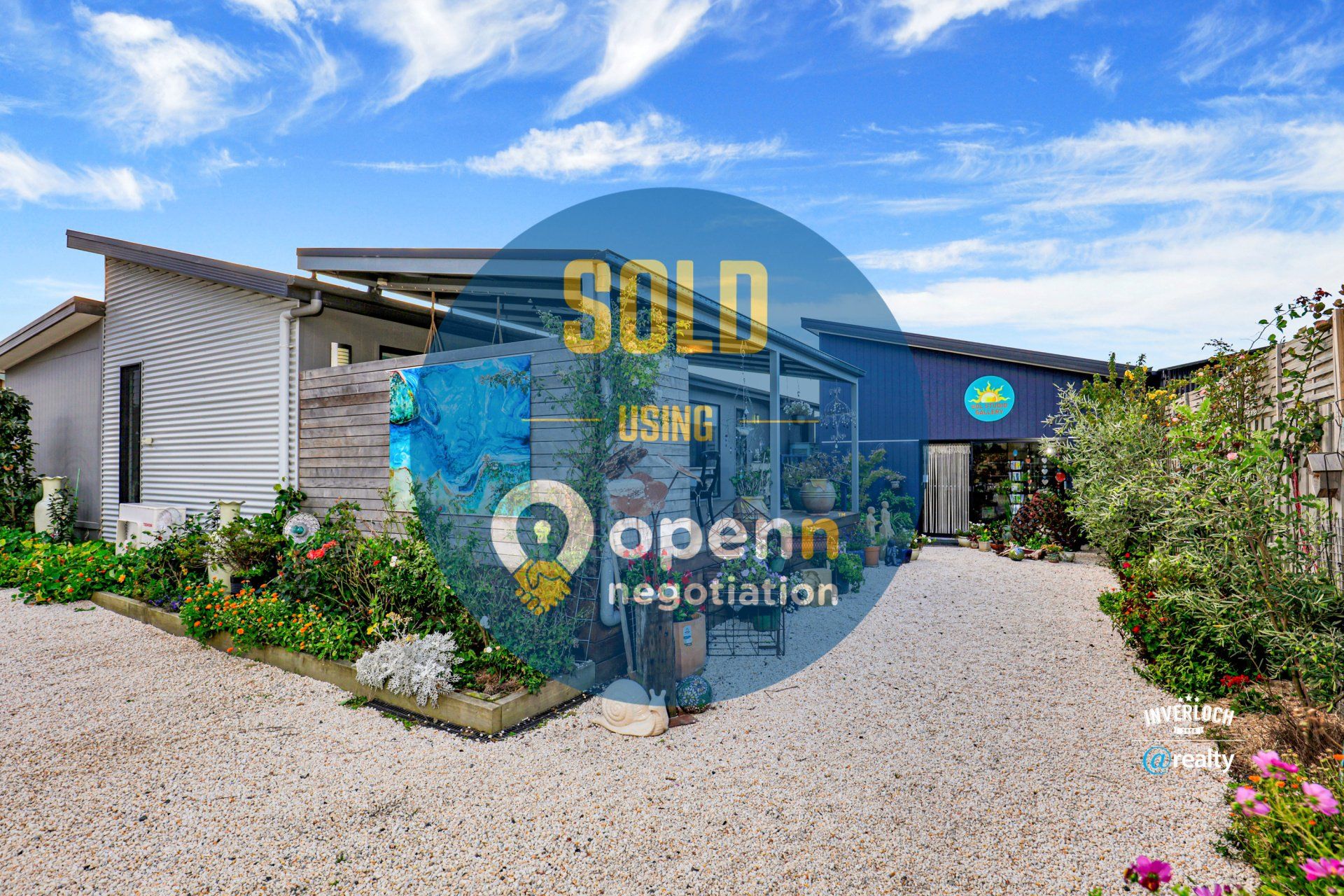 A picture of a house that has been sold.