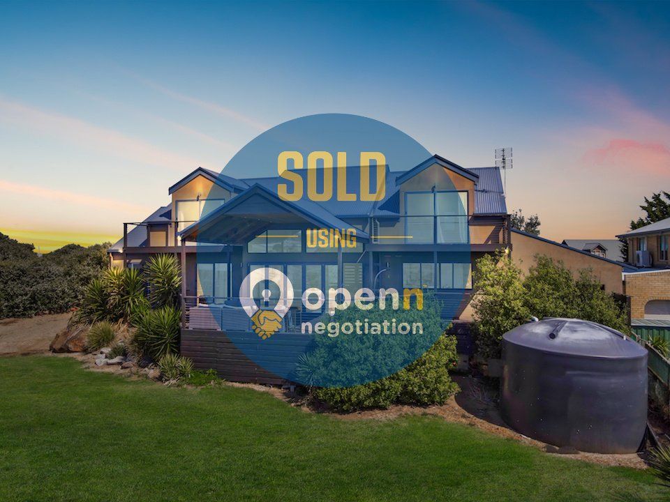 A picture of a house that has been sold by openn negotiation