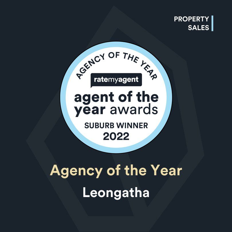 A badge that says agency of the year on it