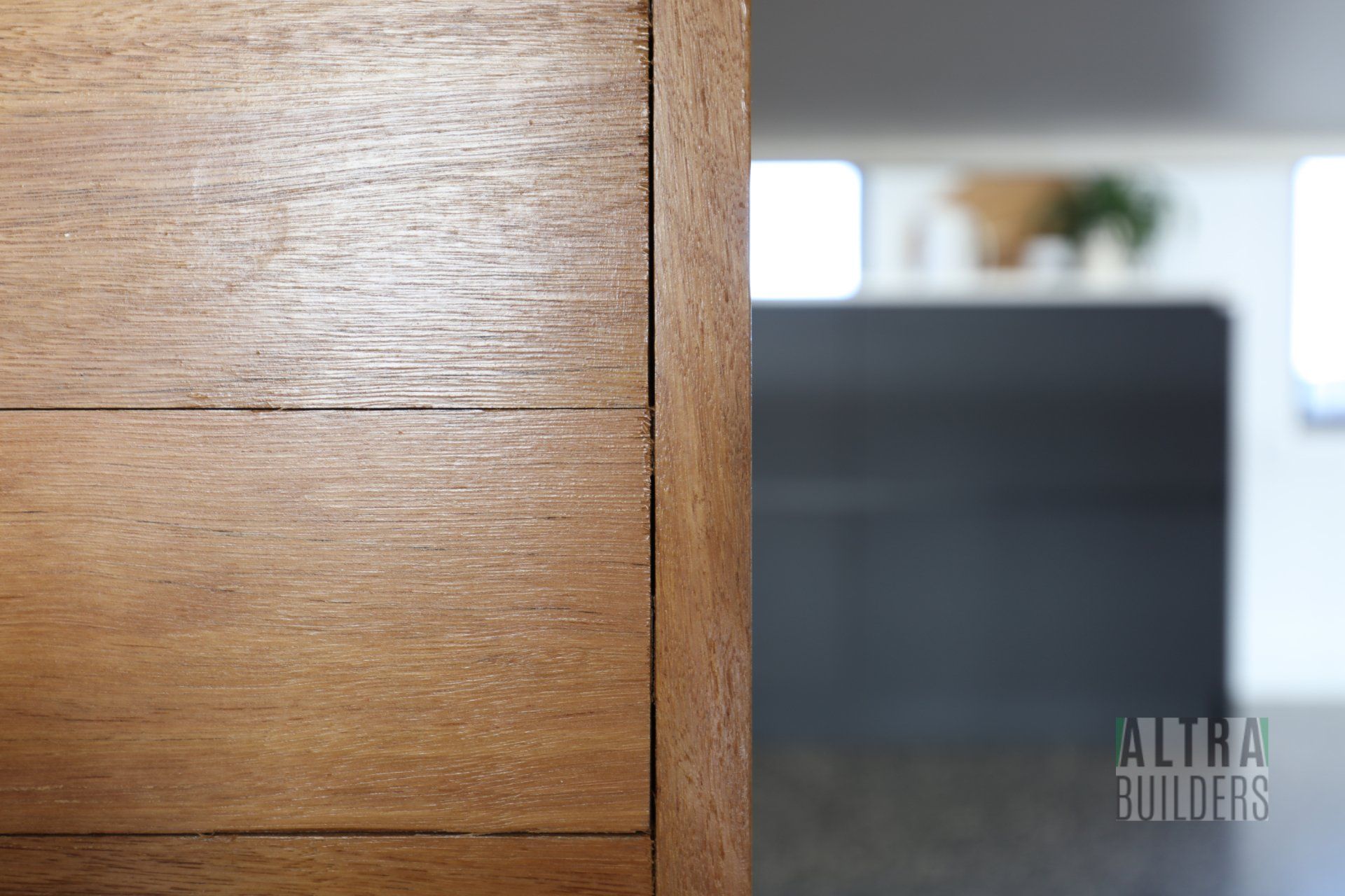 A close up of a wooden dresser with the word outdoors in the corner