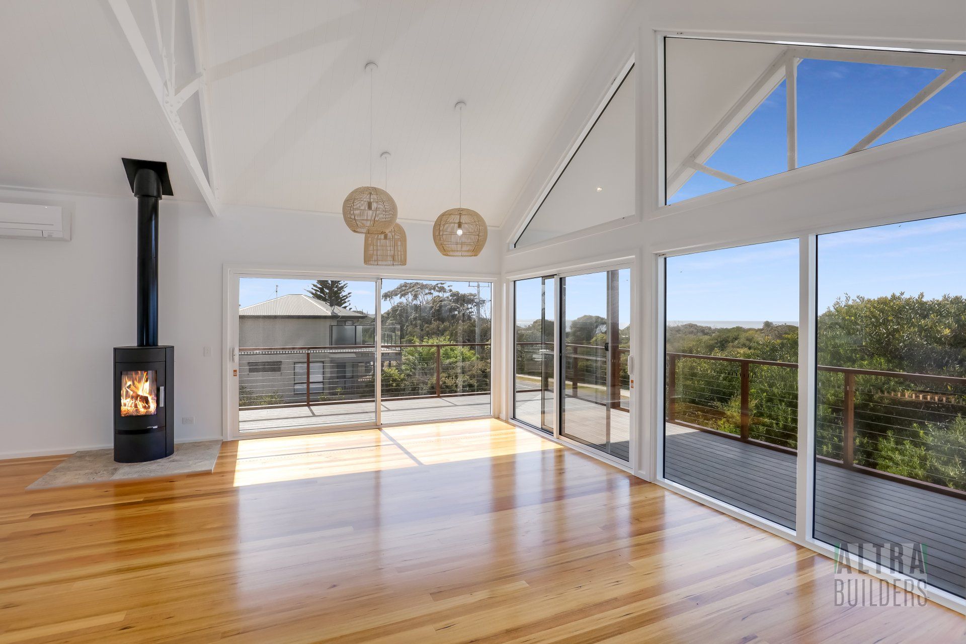 There is a fireplace in the middle of the room.