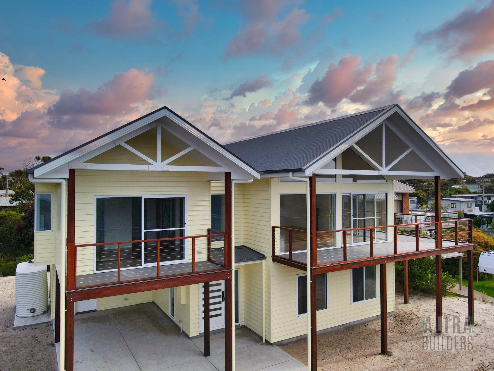 An aerial view of a house with a balcony.