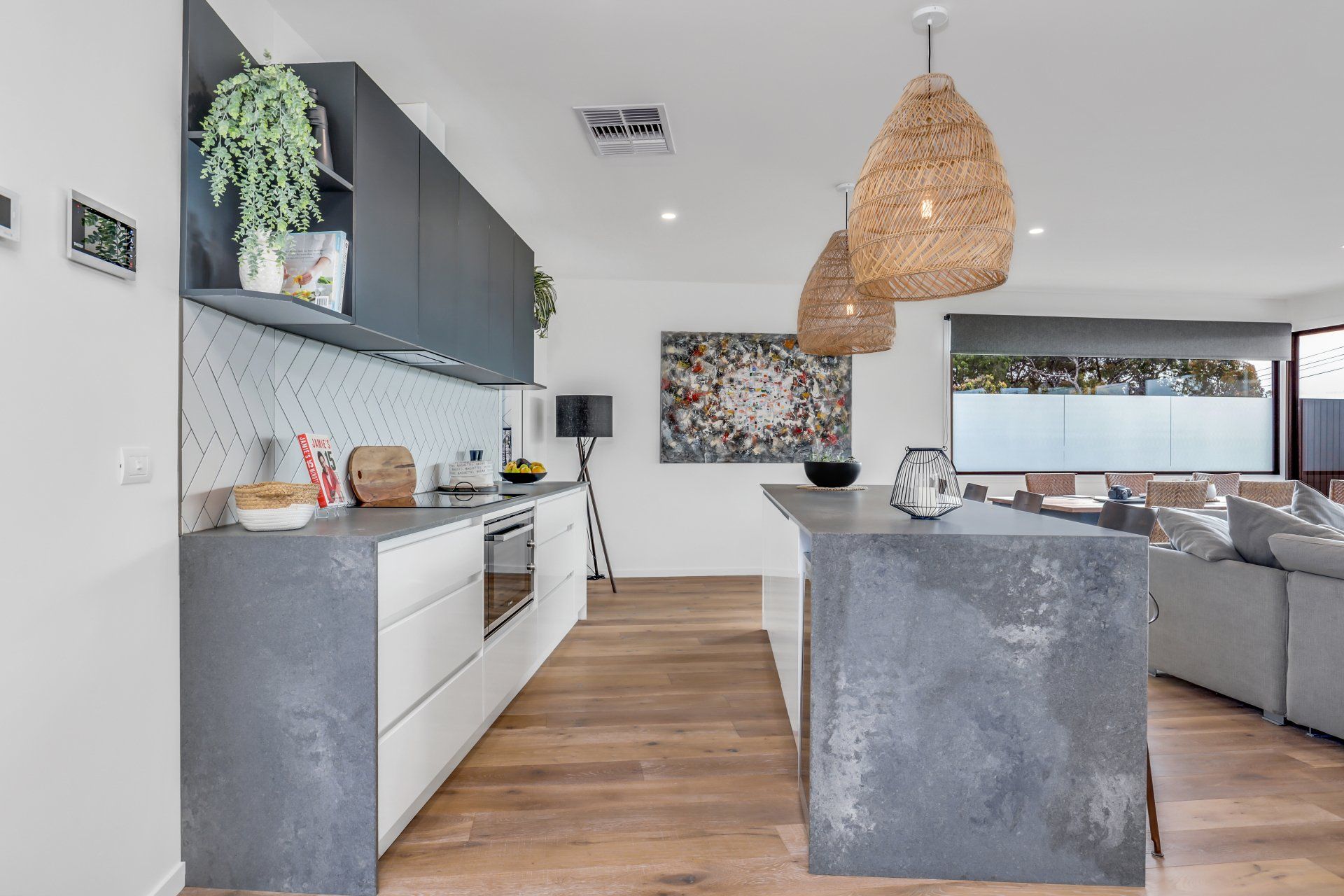 A kitchen with a large island in the middle of the room.