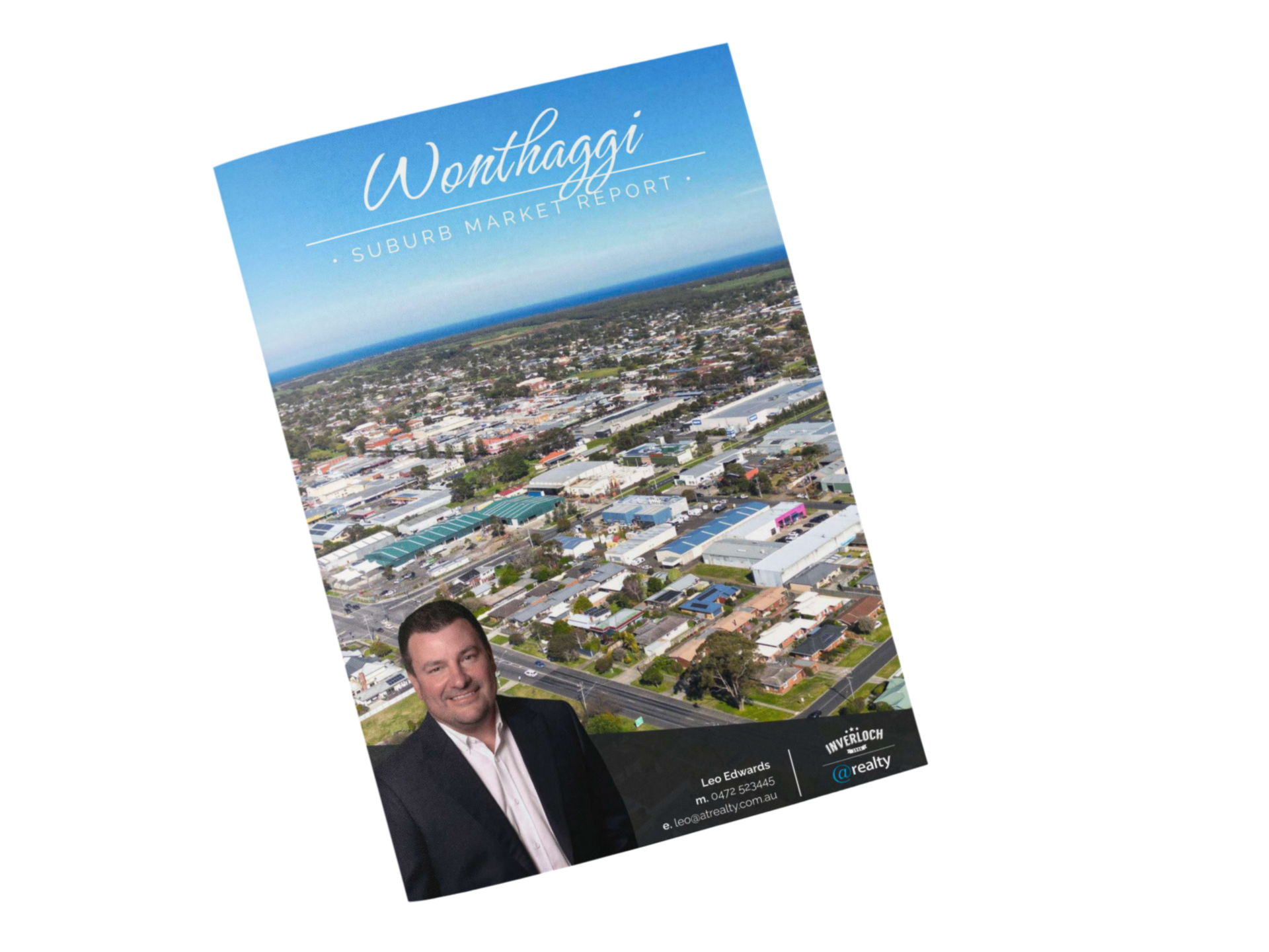 Brochure promoting Wonthaggi, Australia, with town aerial view and smiling man.