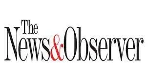 The logo for the news & observer is black and red.