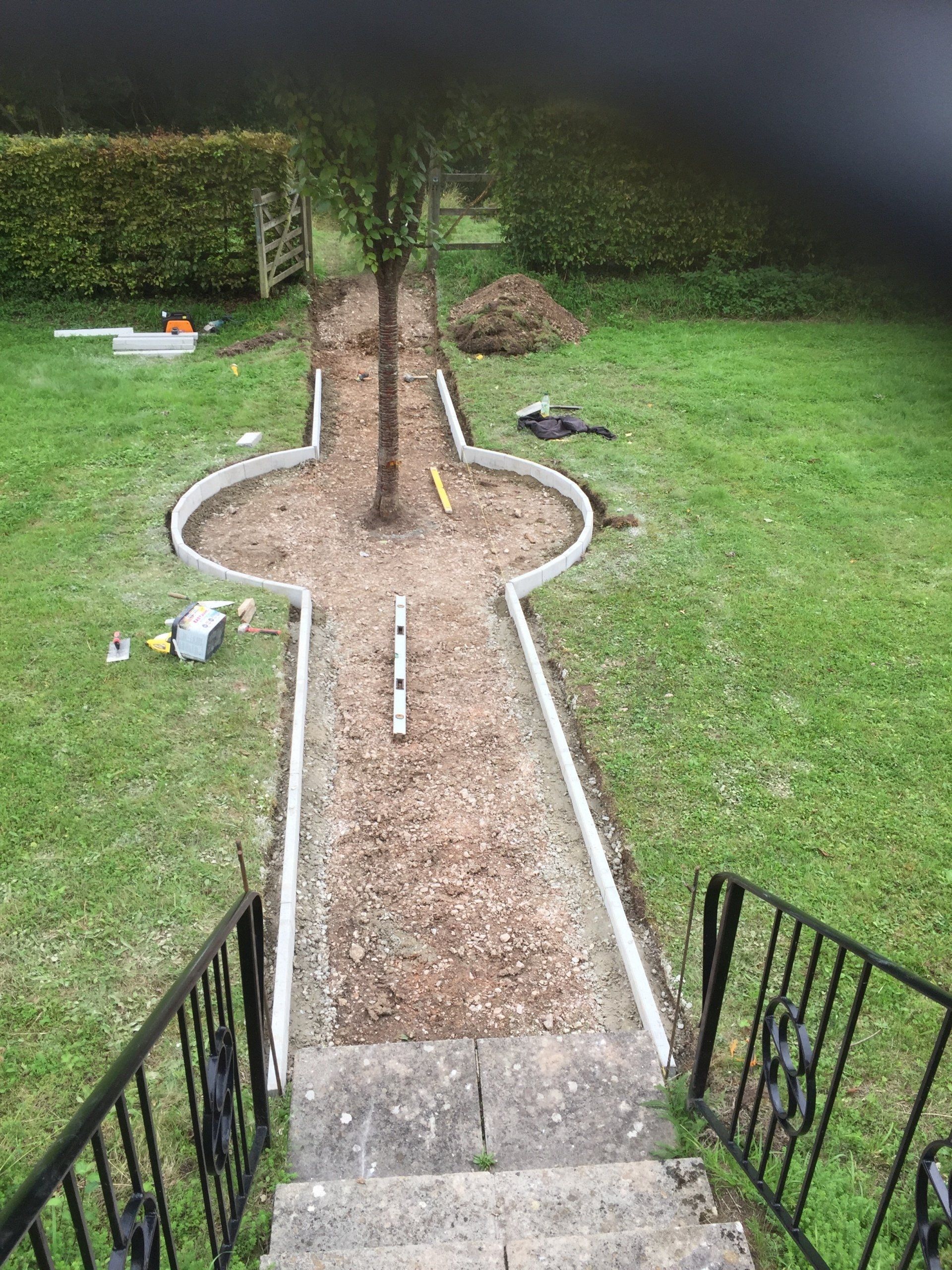construction worker cuts the pipe gutter system