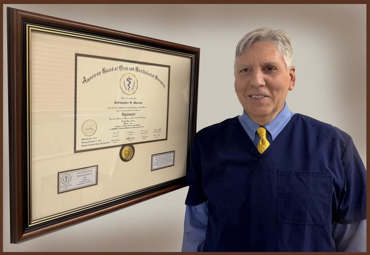 Dr. Christopher H. Martone Beside His Certificate | Natrona Heights, PA | Christopher H Martone