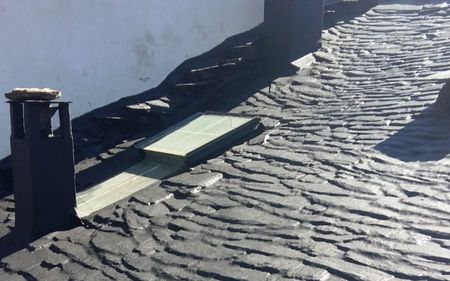 reparación de tejado de tejas de pizarra en vivienda unifamiliar en fuenlabrada, madrid