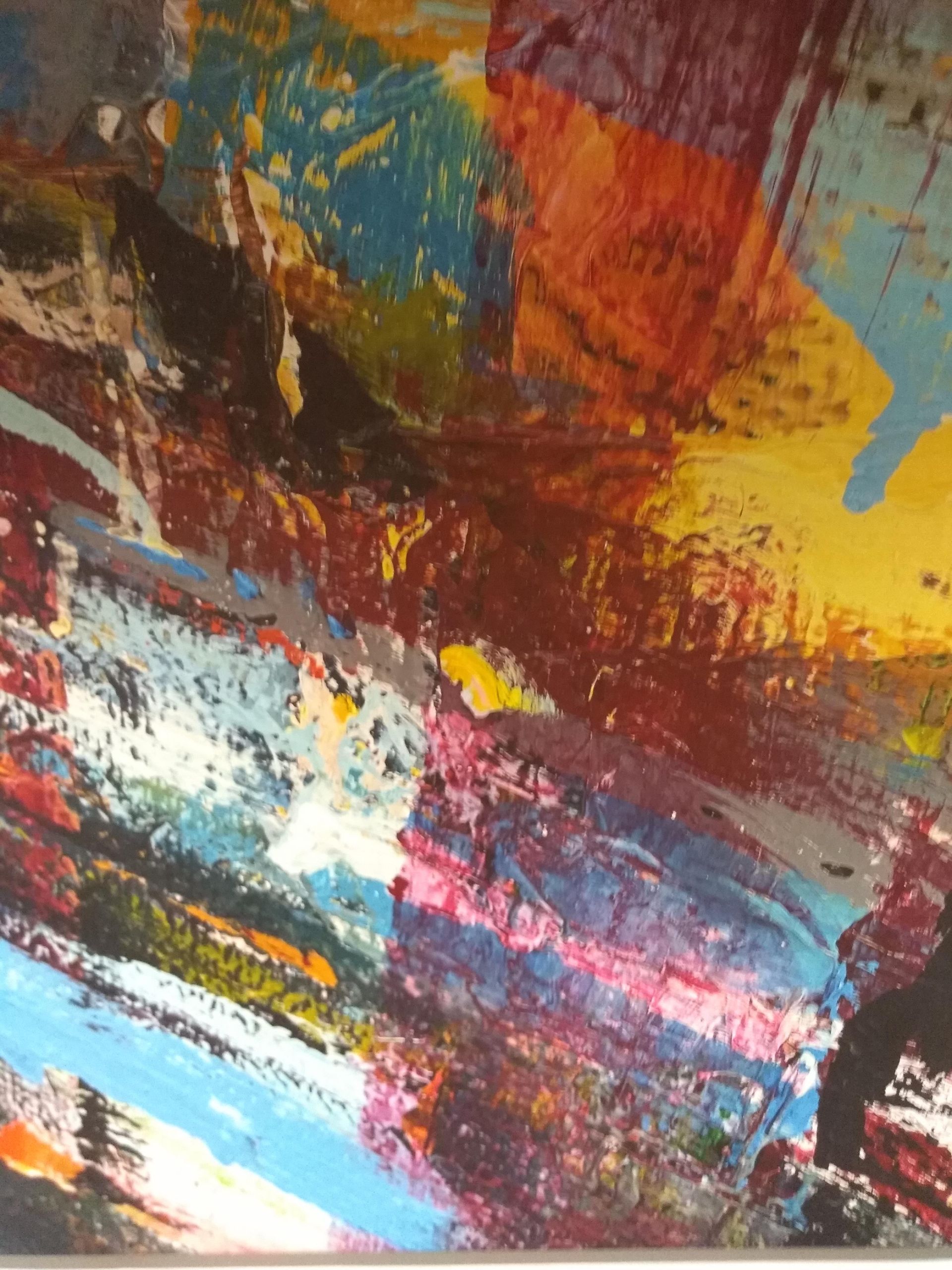 Abstract painting with streaks of blue, orange, yellow, brown, and white.