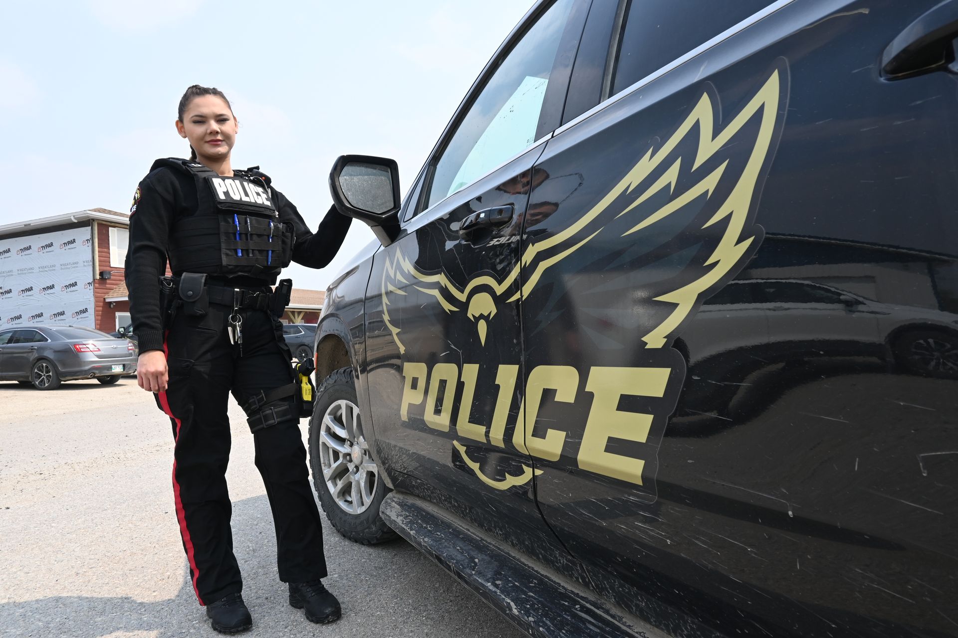 MFNPS-Manitoba First Nations Police Service - Crime Prevention officer standing with Vehicle