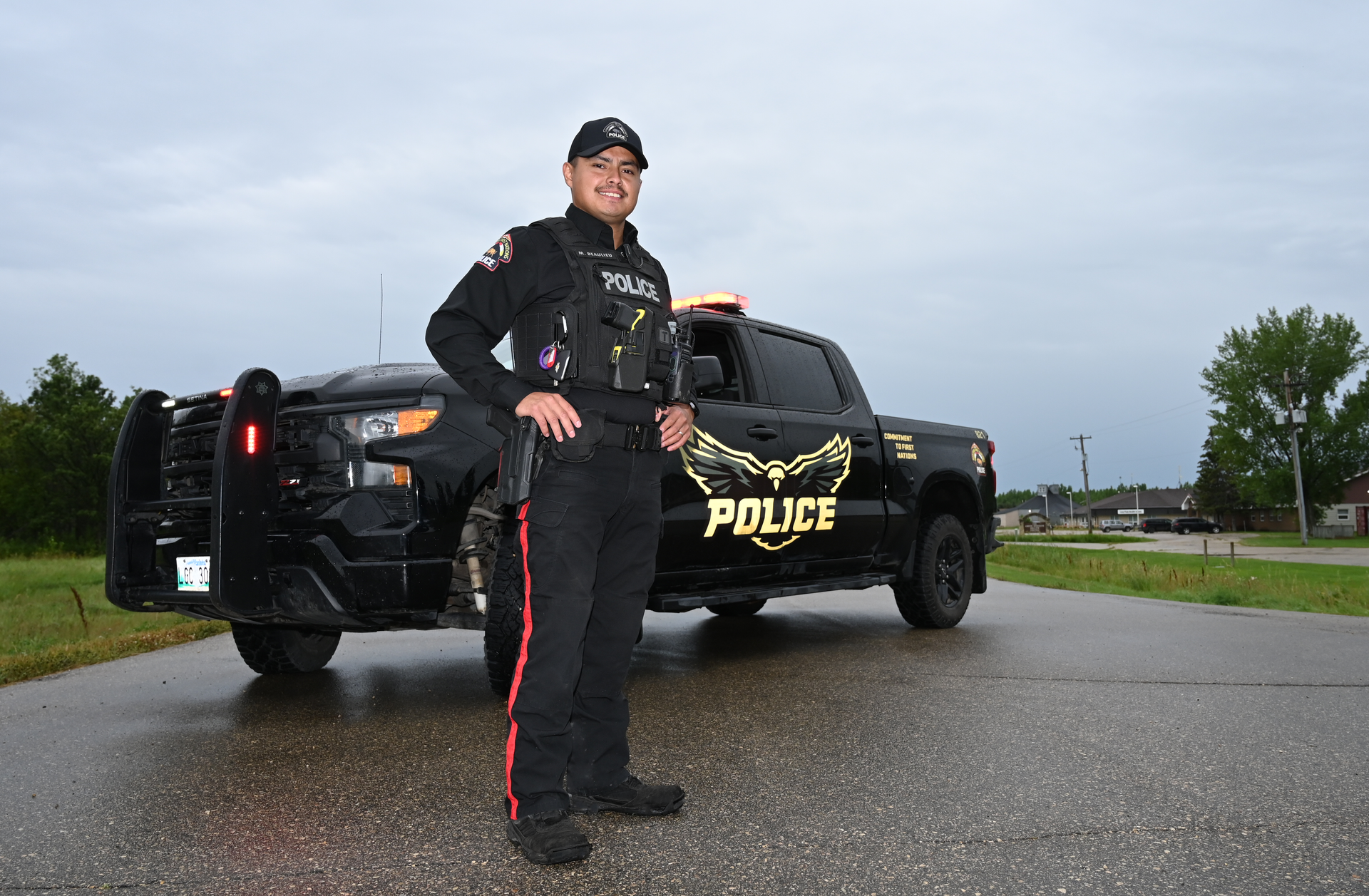 MFNPS-Manitoba First Nations Police Service - Crime Prevention officer standing with Vehicle