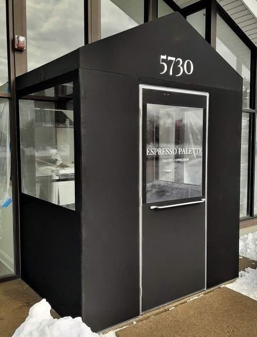 A black building with the number 5730 on it