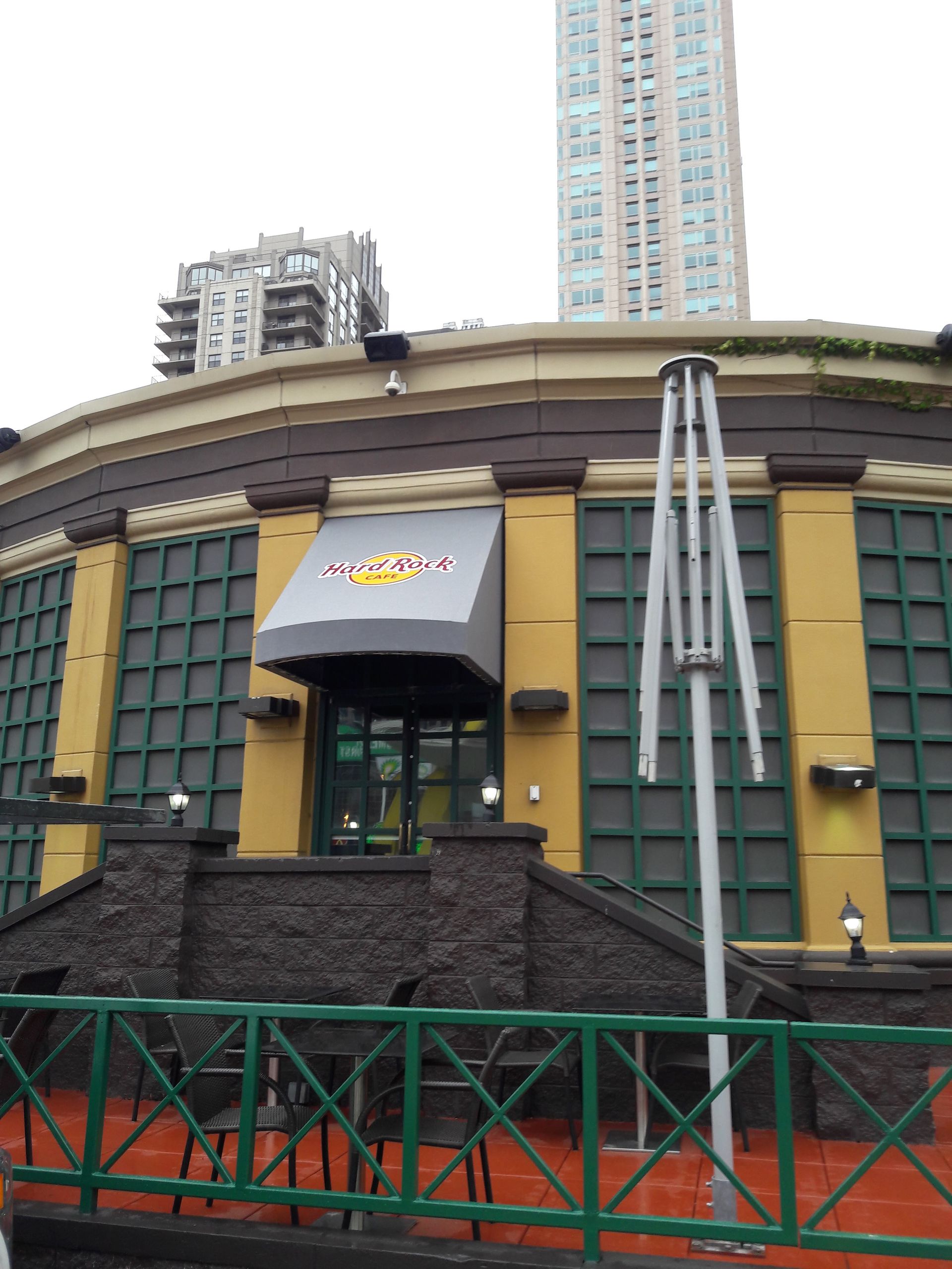 A building with a gray awning that says ' a&w ' on it