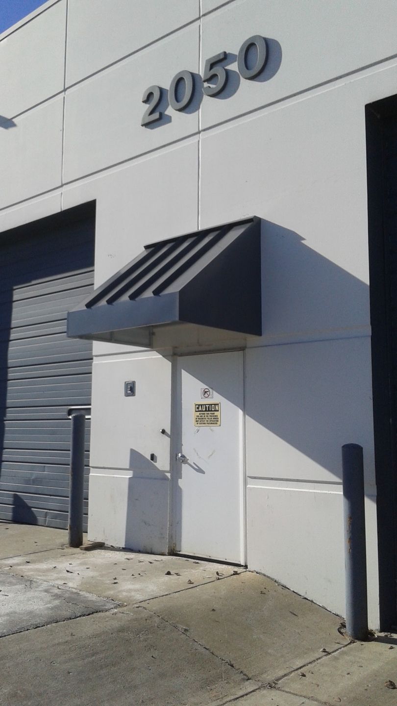 A white building with the number 2050 on it