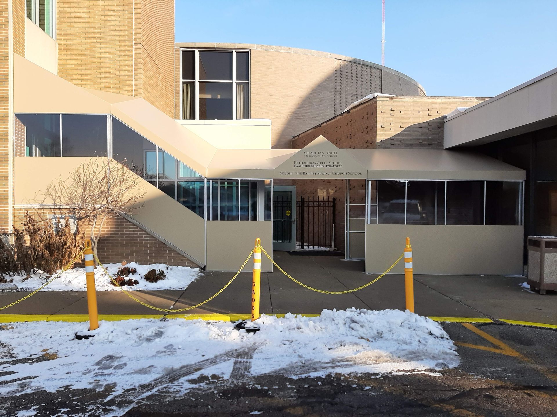 A large building with stairs leading up to the entrance