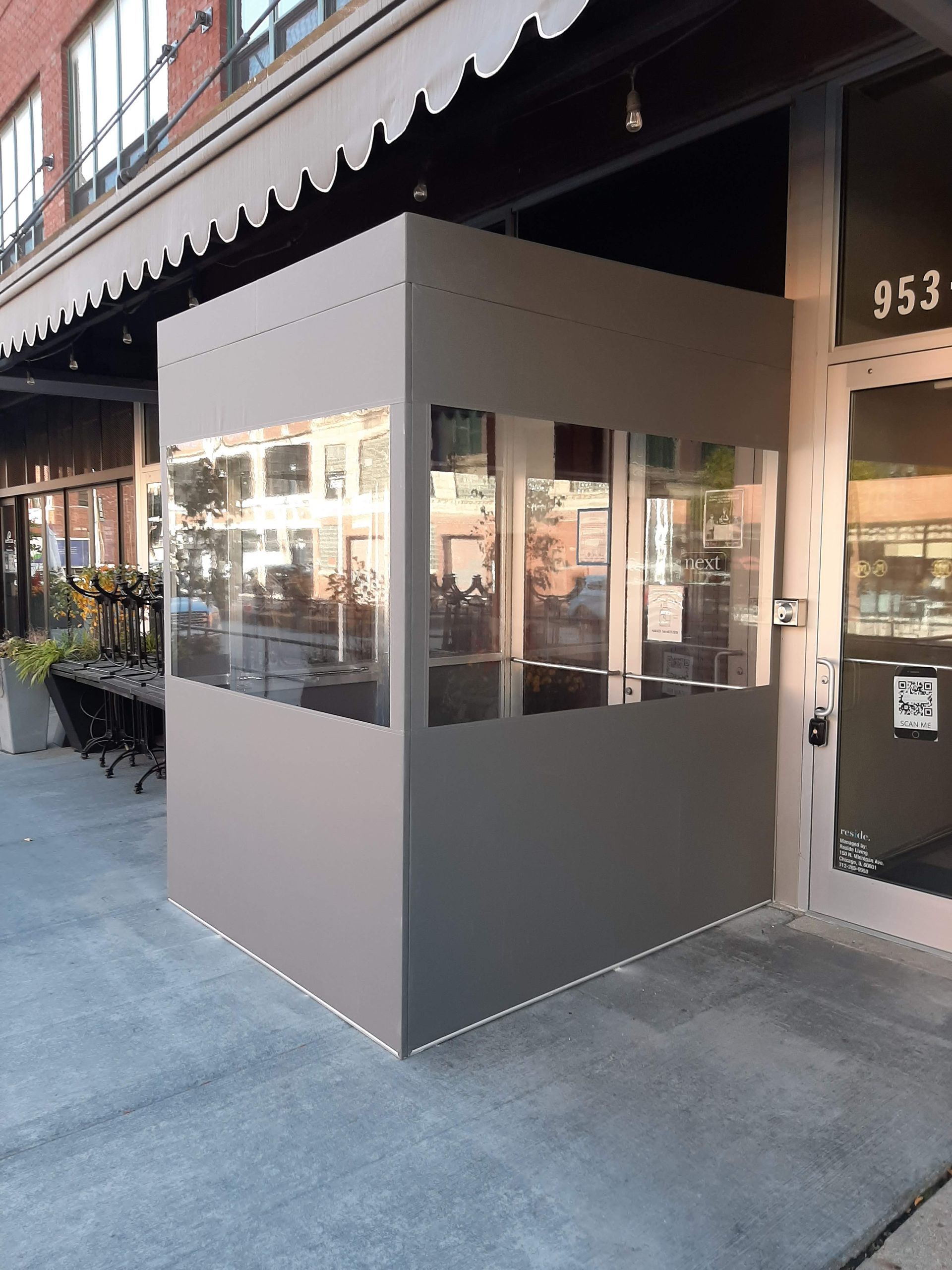 A building with a large window on the side of it.