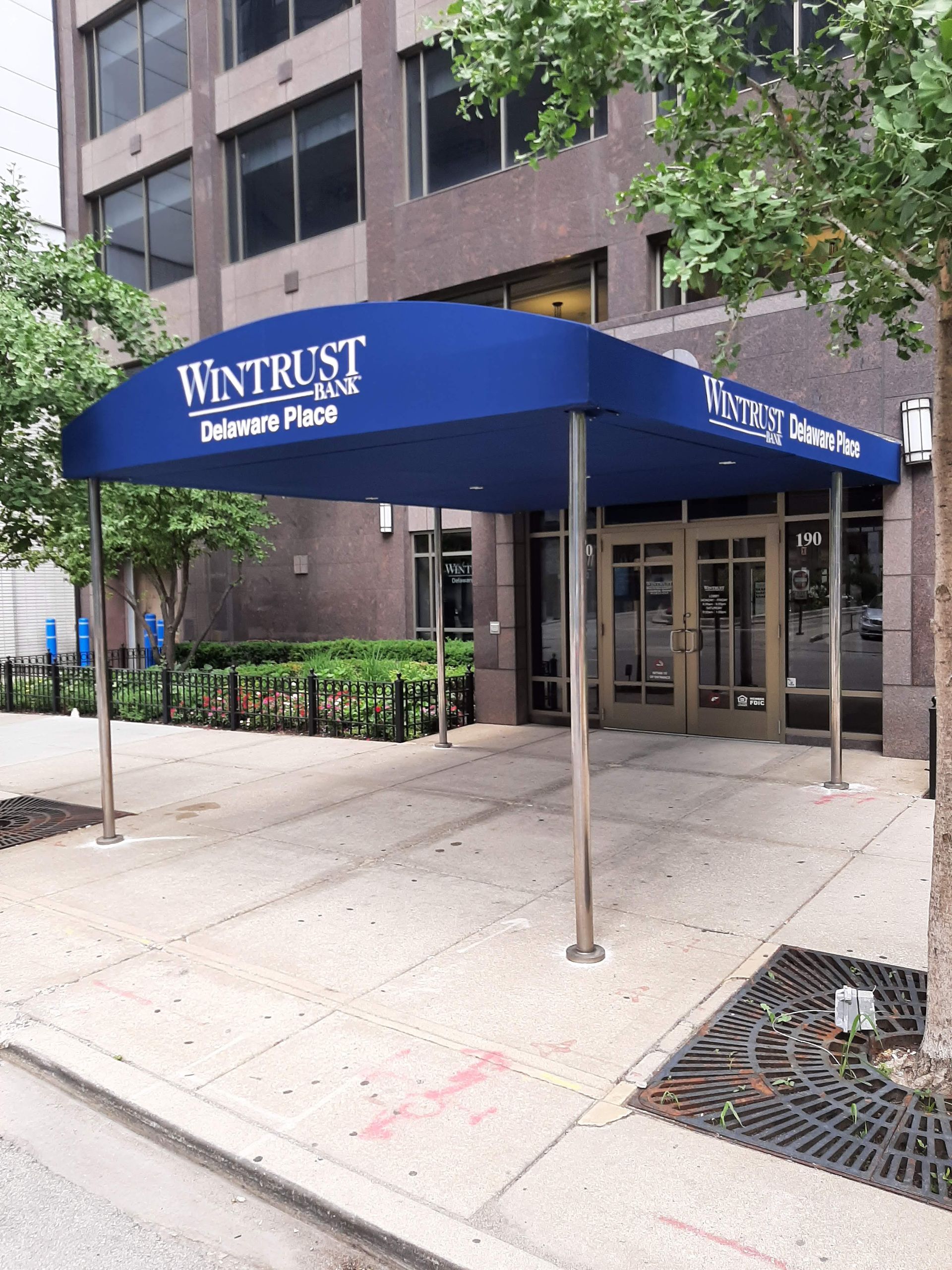 A blue awning with the word wintrust on it