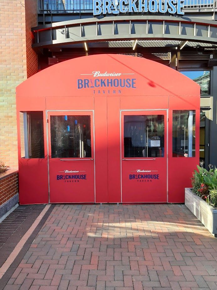 A red building with the word brickhouse on it