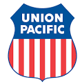 The union pacific logo is a shield with red , white and blue stripes.