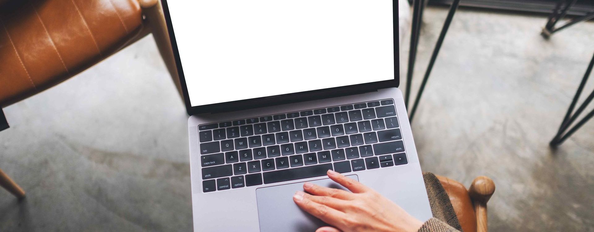 A Woman Drafting Up a Lead Magnet On Her Computer