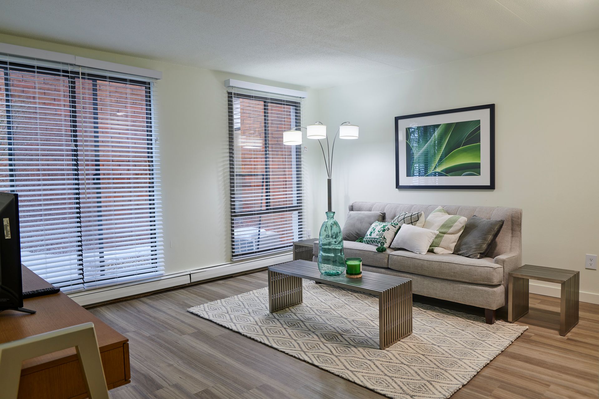 A living room with a couch and a coffee table