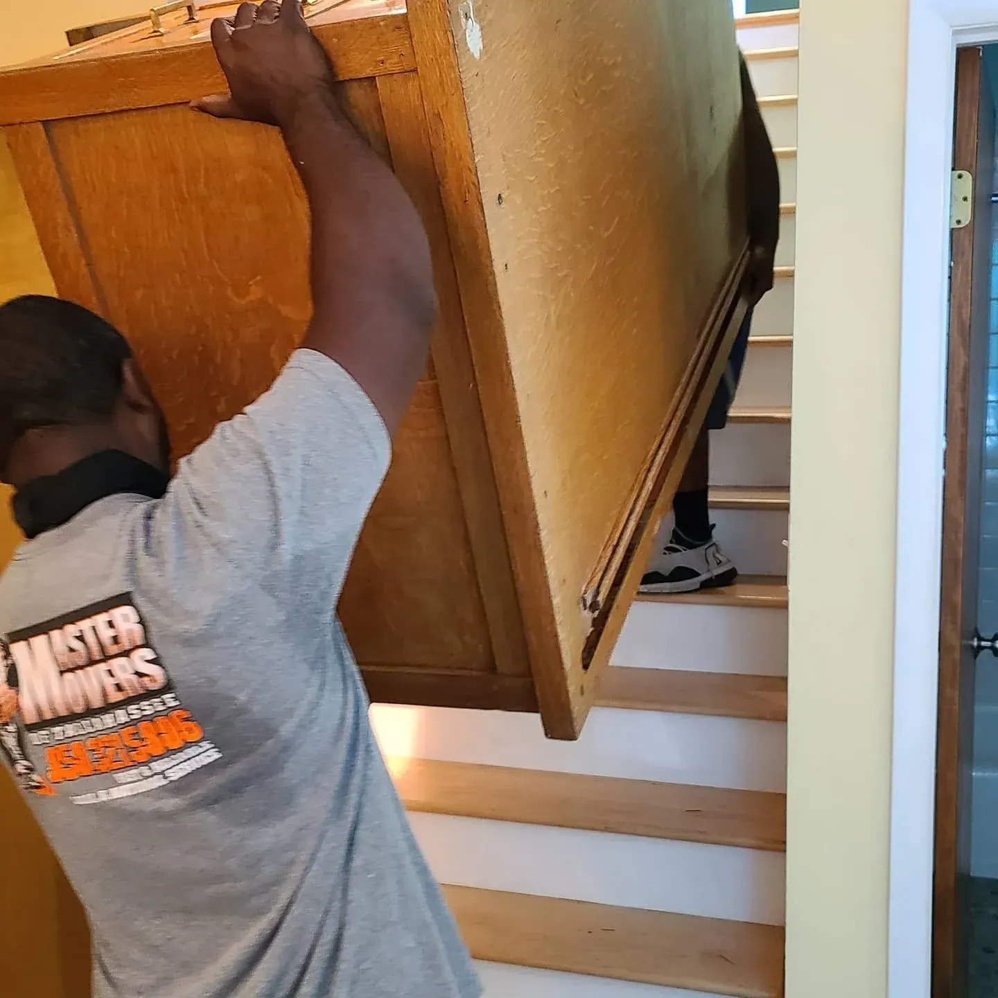 Master Movers of Tallahassee crew protecting household furniture Master Movers of Tallahassee crew protecting household furniture
