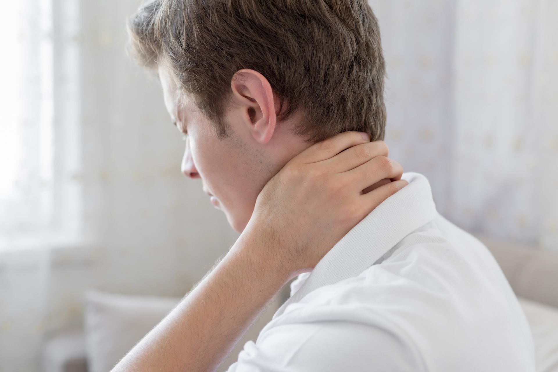 Man With Neck Pain — Plano, TX — North Texas Center for Pain Management