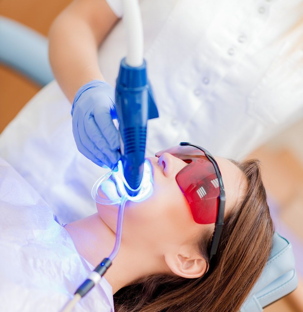 Dr. Blaine Leeds DDS Dental Dentist Surgery Clarksville Arkansas Services Whitening Teeth Laser